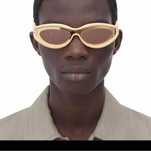 Luxury futuristic cat eye oval mustard pastel yellow steampunk sunglasses